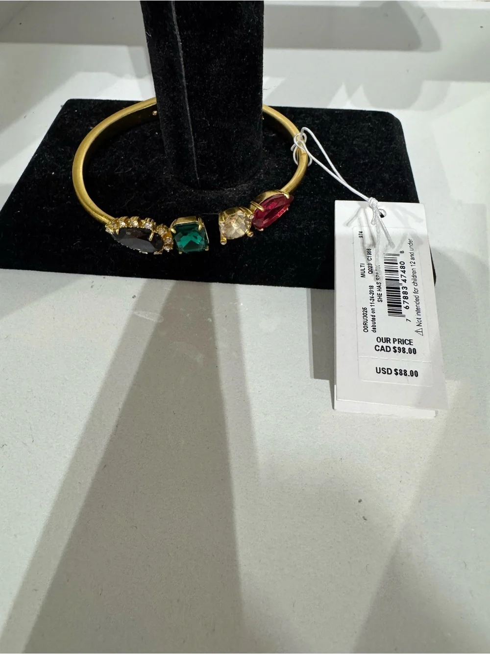 kate spade Gold-Tone Bracelet with Black, Green, Champagne and Ruby Stones - Picture 2 of 3